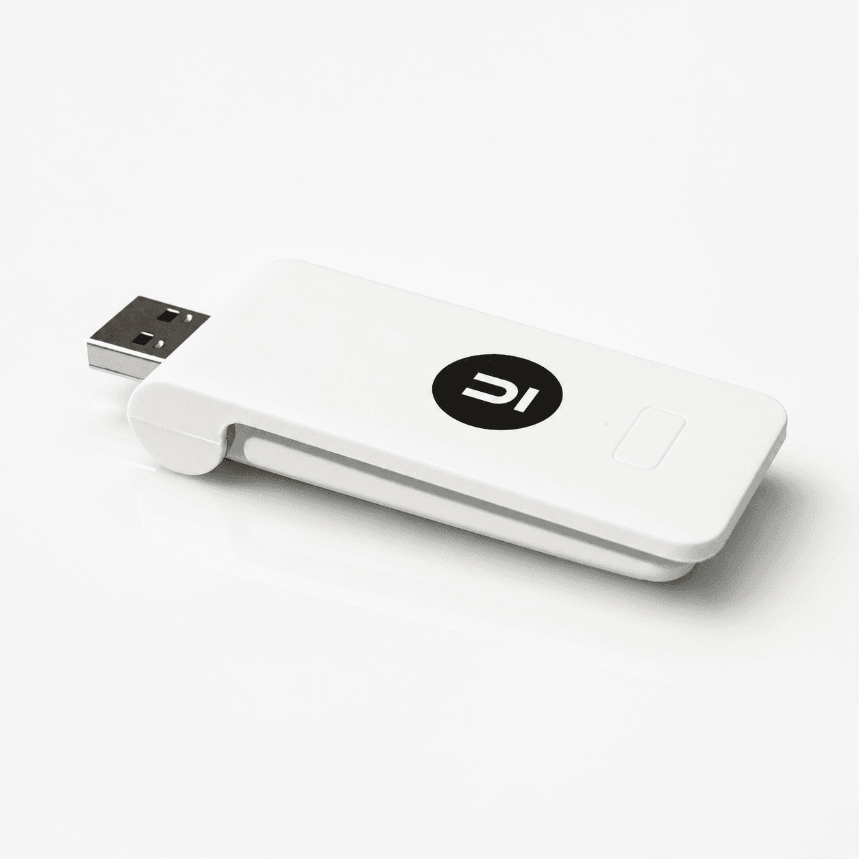 The UBlockout SmartHub, a small white USB device with a black circular logo
